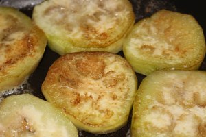 Cooking eggplant in butter.