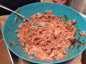 Pulled pork mixed with grilling sauce.